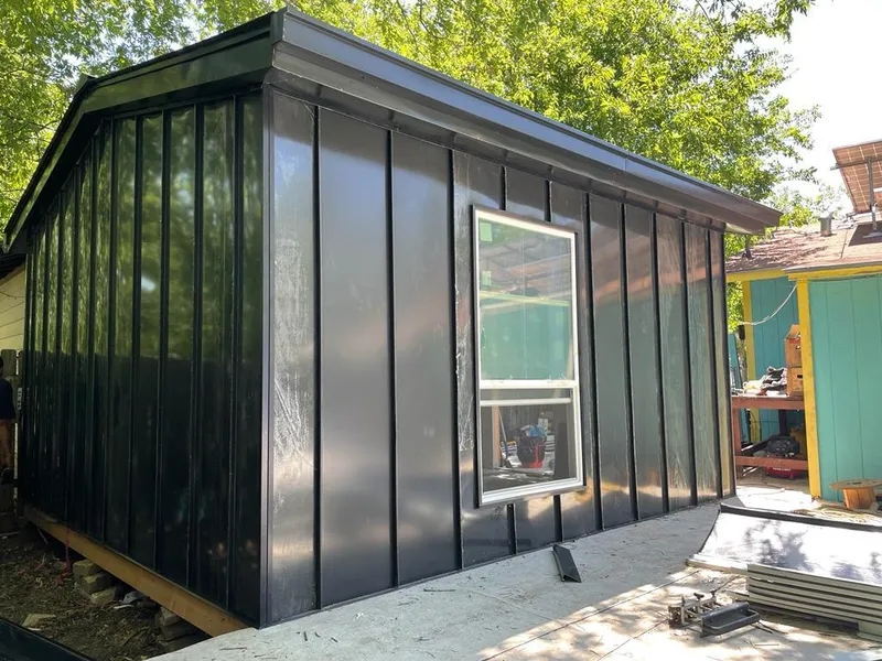 Black standing seam metal wall panels for Roof Inspection in Williamsburg