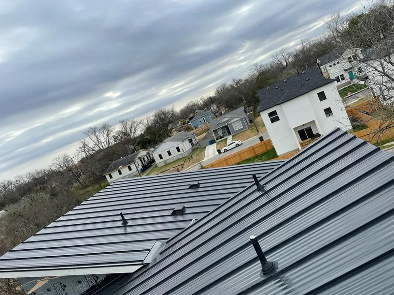 Standing seam metal roof panels with vents for Skylight Repair in Williamsburg